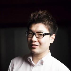 手塚　智哉